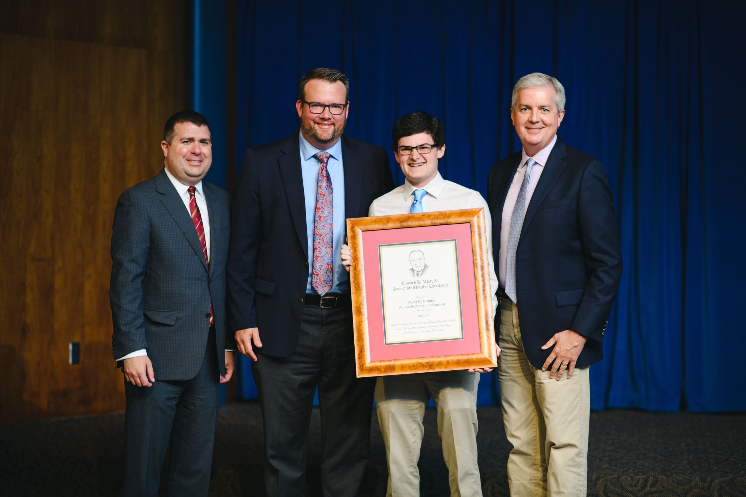 2018/2019 Alter Award - Georgia Tech Group celebrating award presentation with framed certificate.