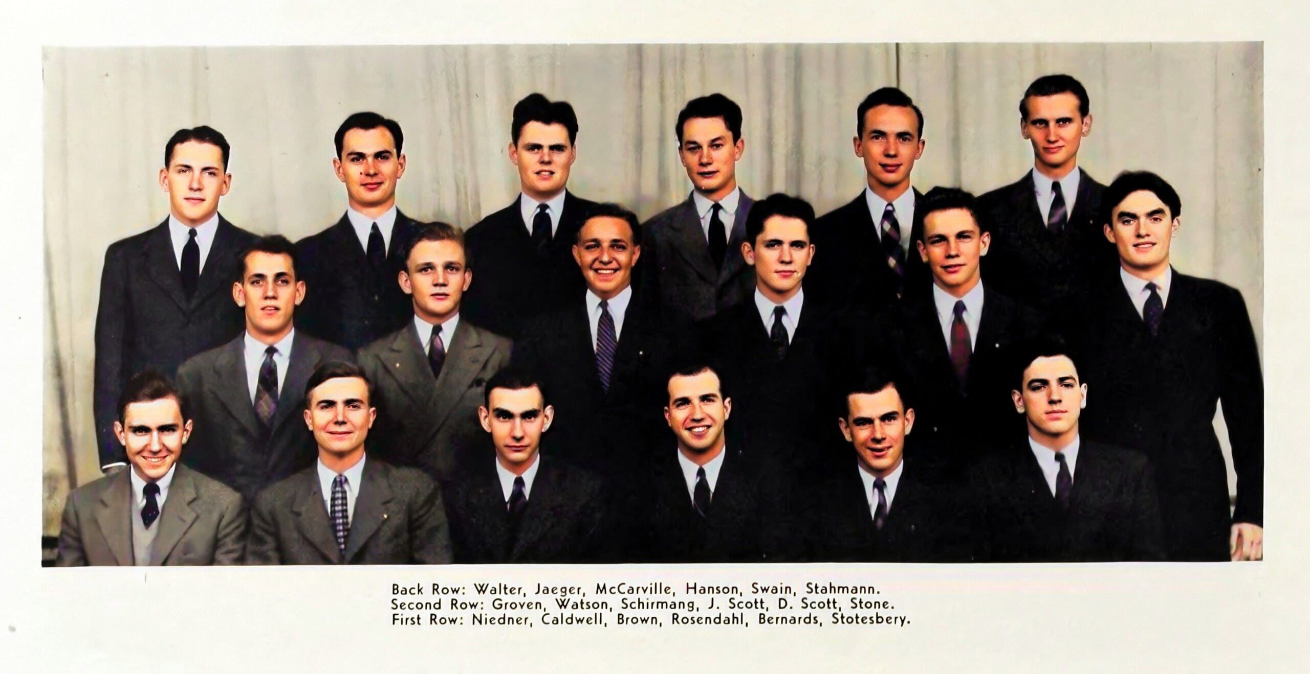 Group photo of men in formal attire, vintage style.