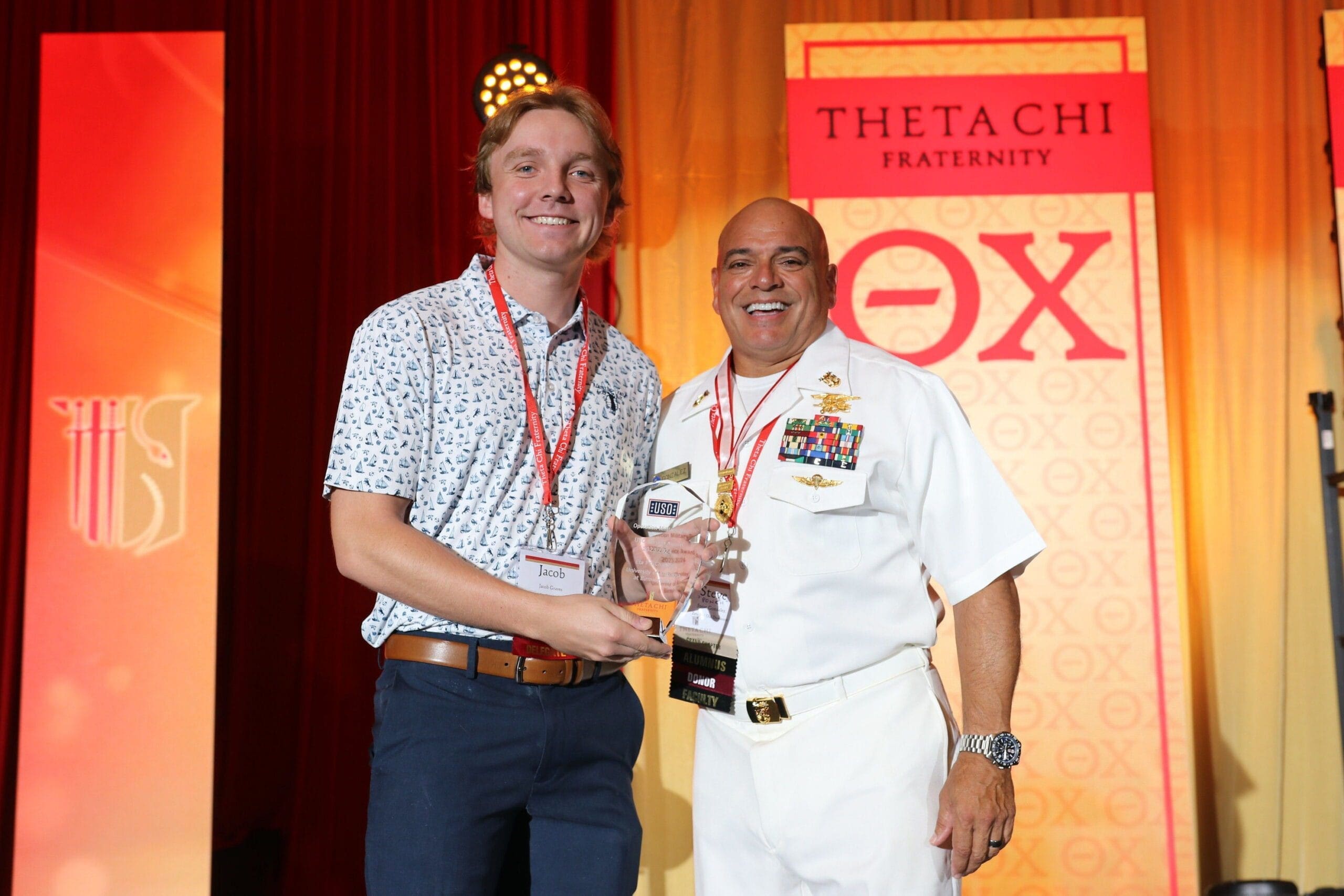 Award presentation at Theta Chi fraternity event.
