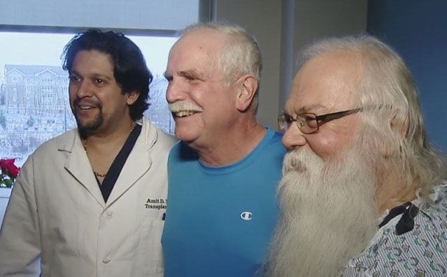 A Kidney for Santa Three men smiling together in a hospital setting.