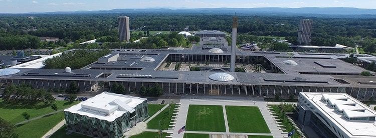 Aerial view of university campus with modern architecture.