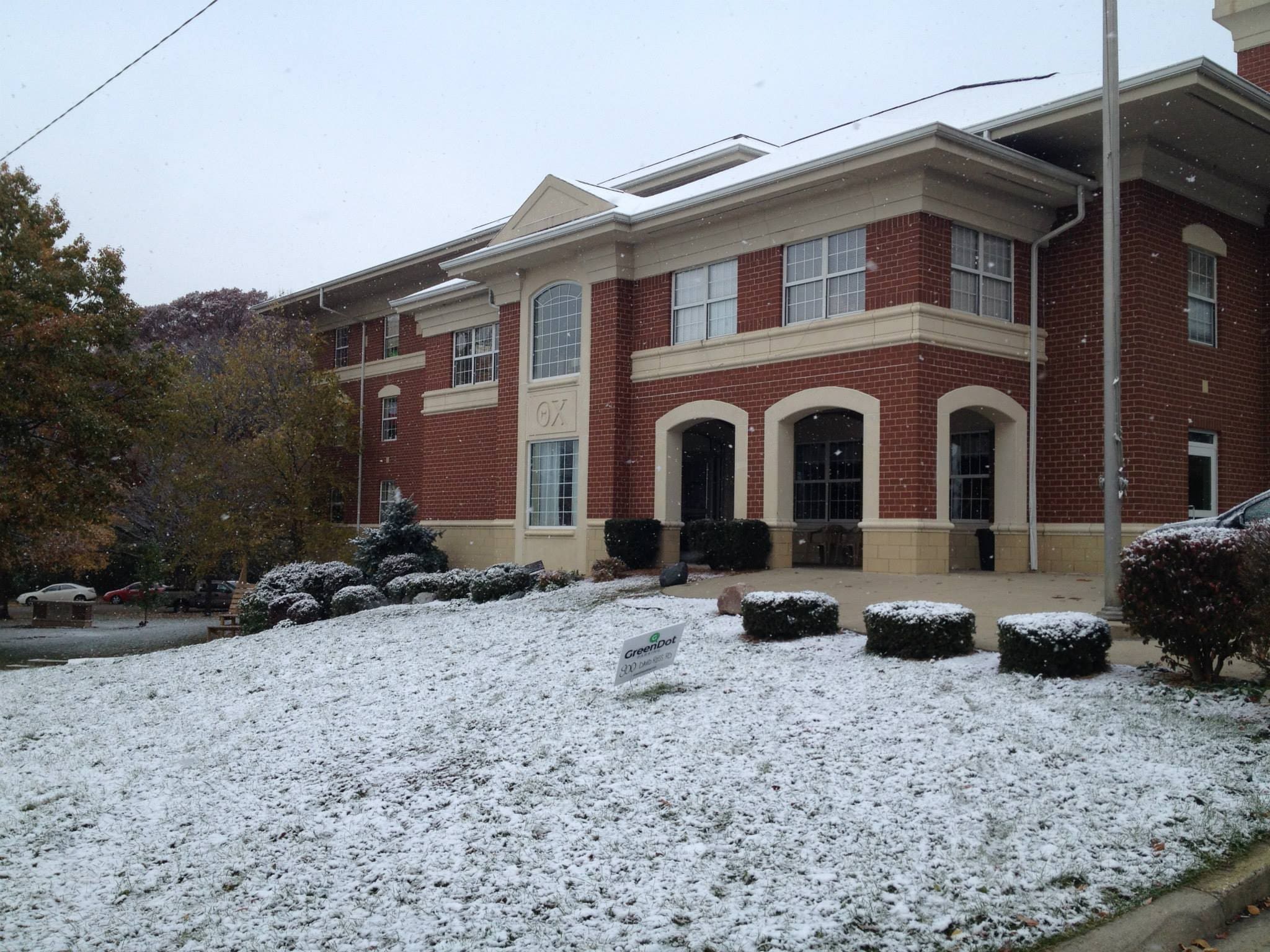 Purdue Brick building with snow-covered landscaping.