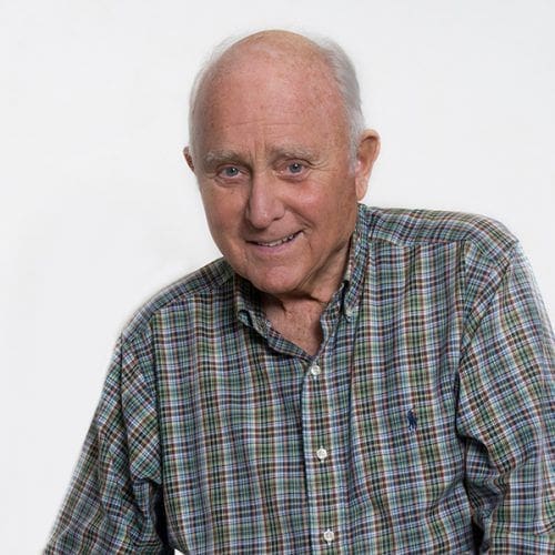 David Mirisch - Delta Omega - Ripon Smiling elderly man in plaid shirt portrait.