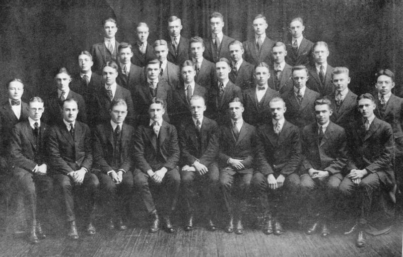 Historical group photo of men in formal attire.