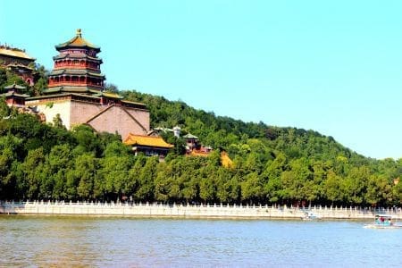 Summer Palace in Beijing with lush greenery and water.