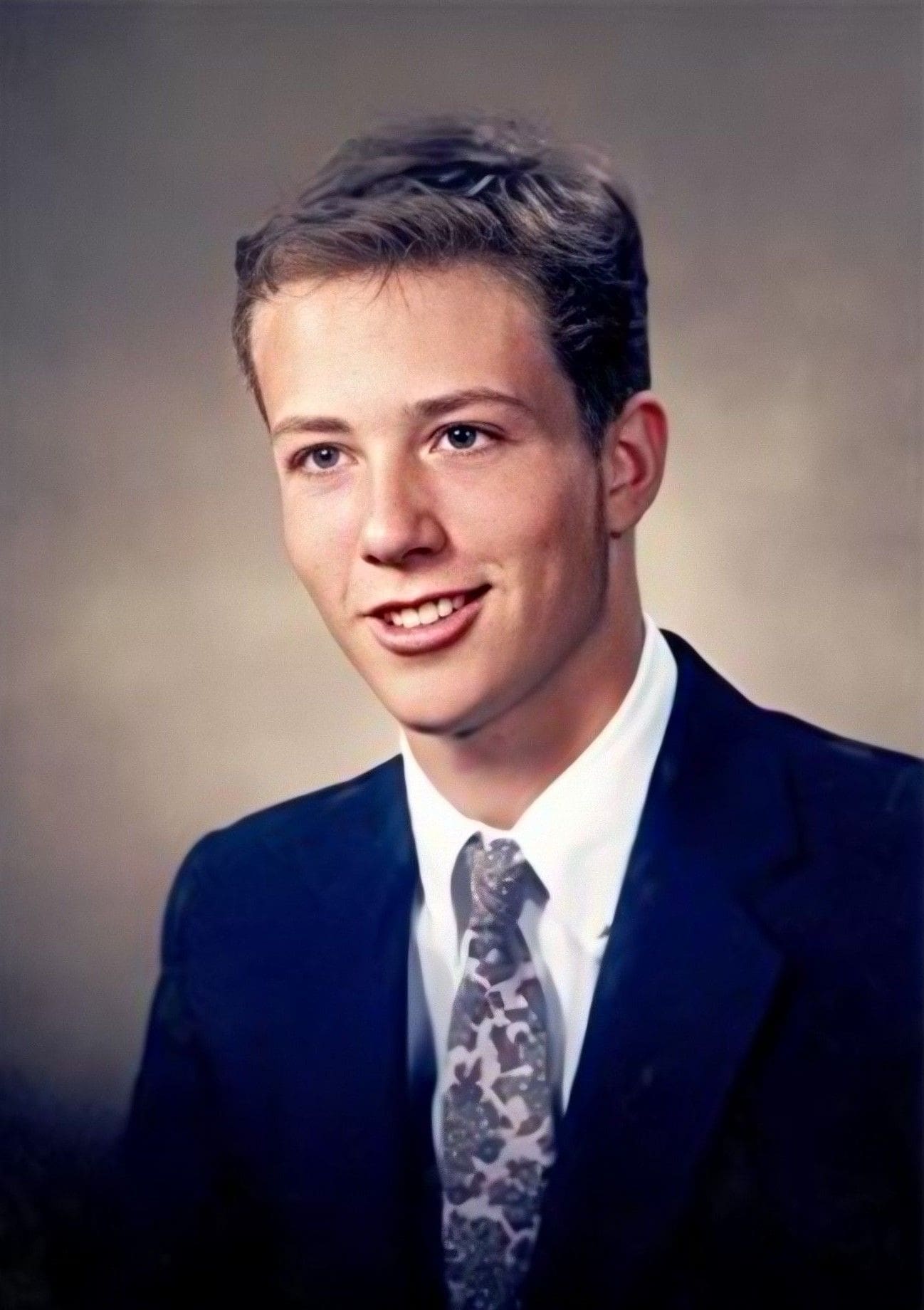 Young man in formal suit with tie.