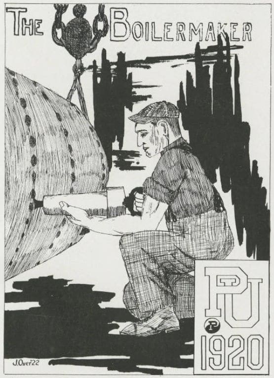 Purdue Worker inspecting large industrial machinery component.