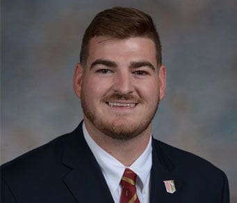 Brandon Taylor Professional headshot of a smiling young man.