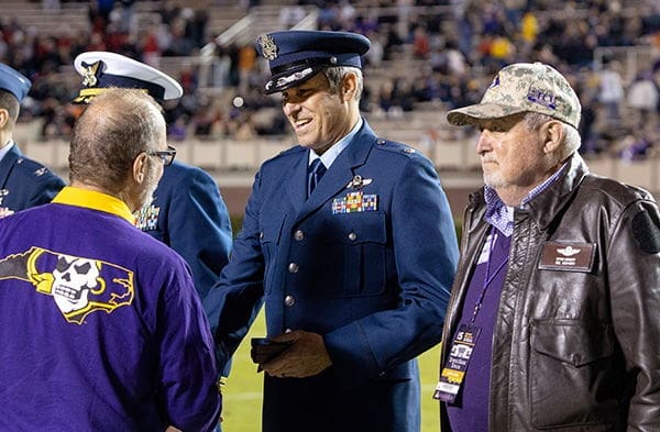 Bryan Bennett Military officer greeting attendees at an event.