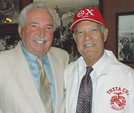 Buddy Davis Two men smiling at a social event.