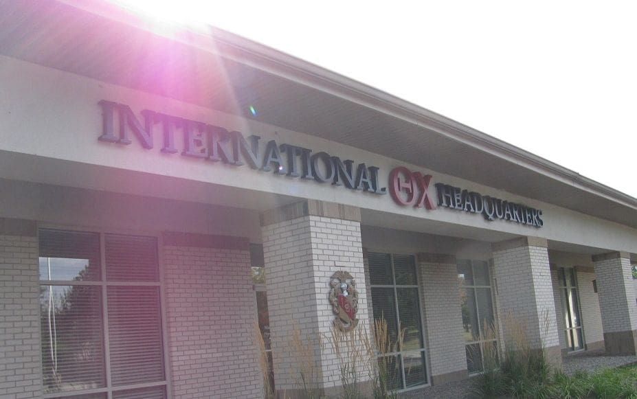 International GX headquarters building exterior sign.