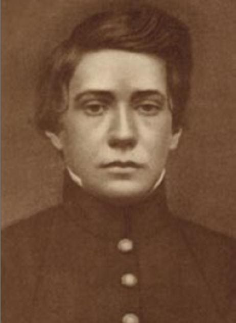 Historical portrait of a young soldier in uniform.