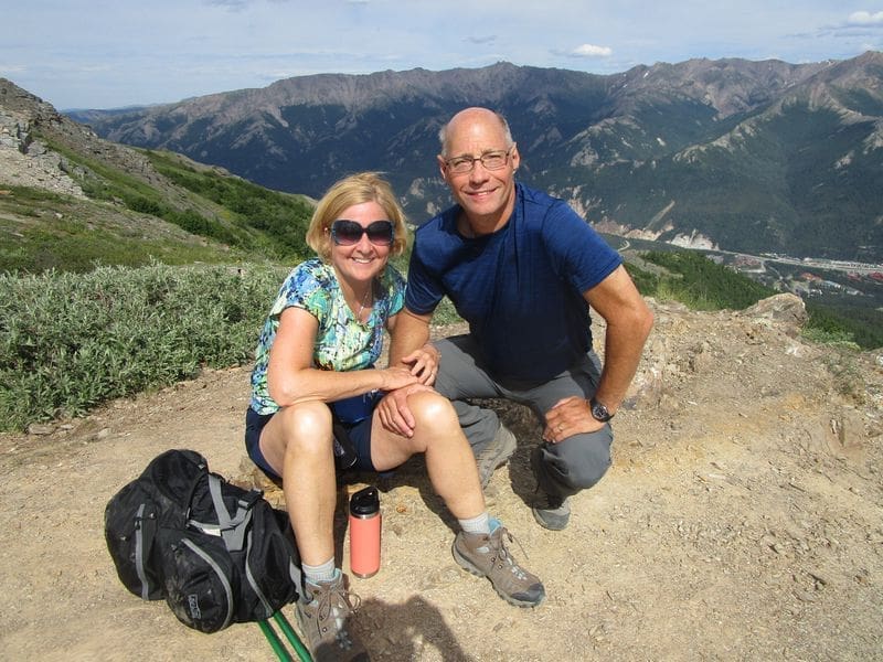 Hikers enjoying a scenic mountain view together.