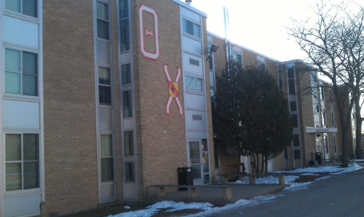 Brockway Hall exterior with snow-covered ground.