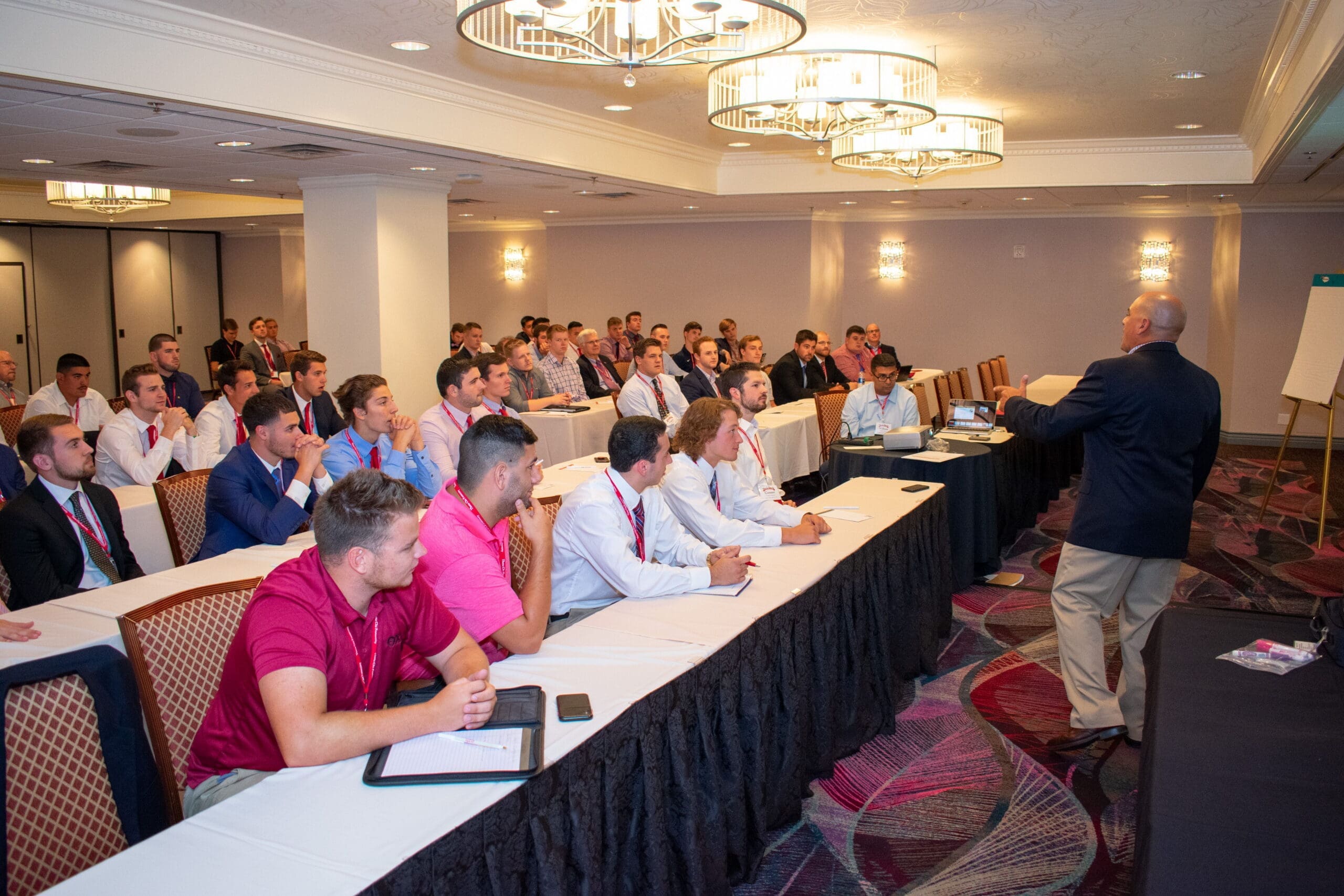 2018 Convention - Ponch Business seminar with engaged audience in conference room.