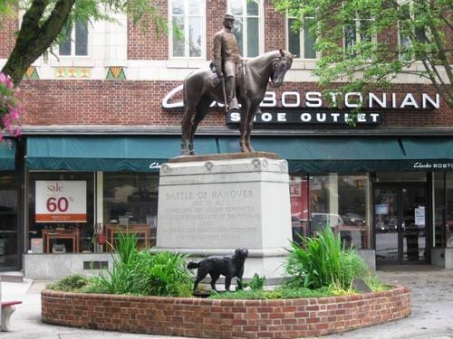 Statue of soldier on horseback in Hanover Square.