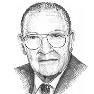 Portrait of a distinguished older man with glasses.