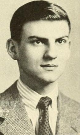Lee Iacocca Young man in formal attire, vintage portrait photograph.