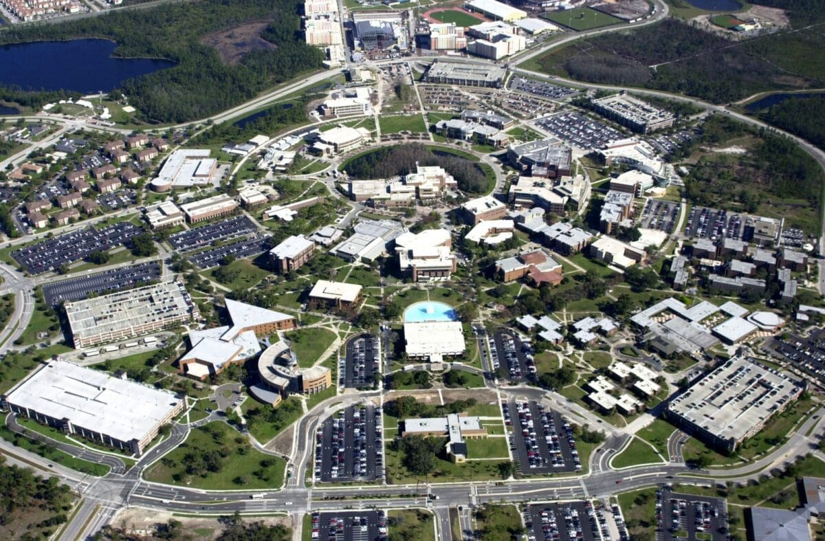 Aerial view of a university campus with parking.