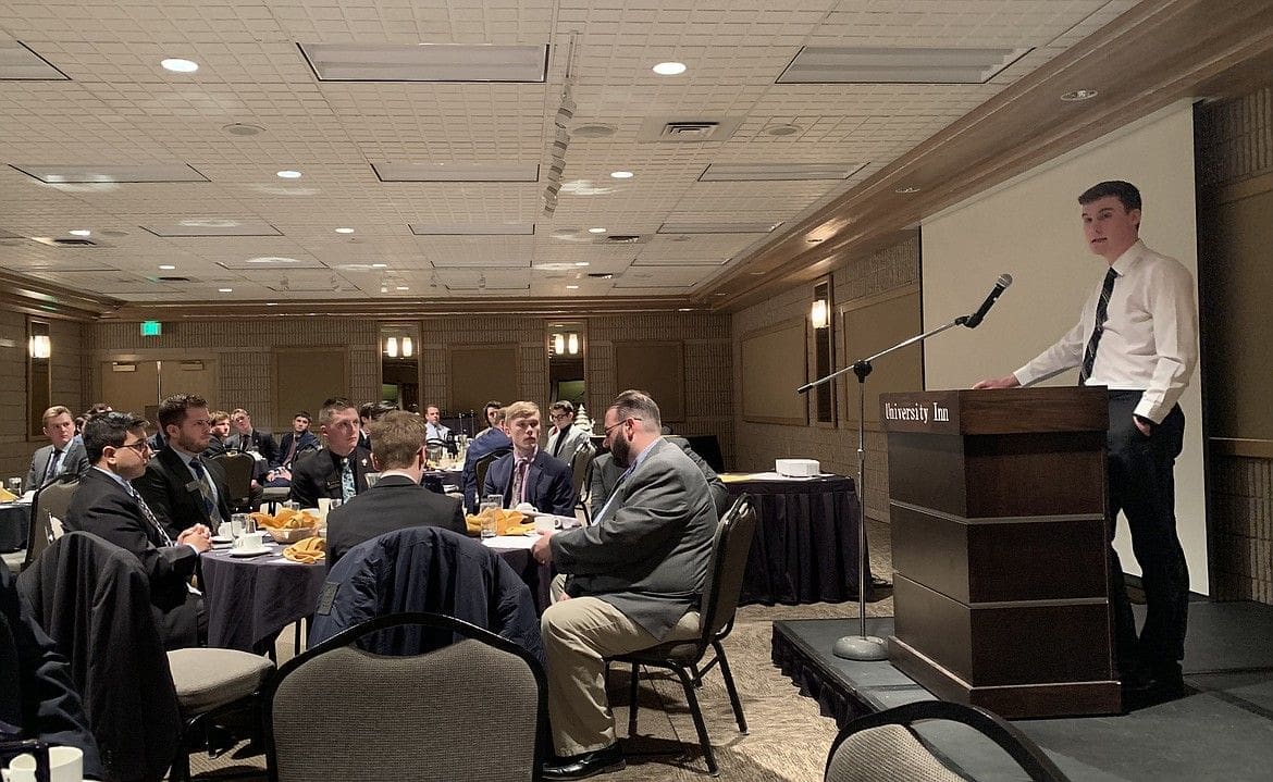 James Trayford Business dinner event with attendees engaged in conversation.
