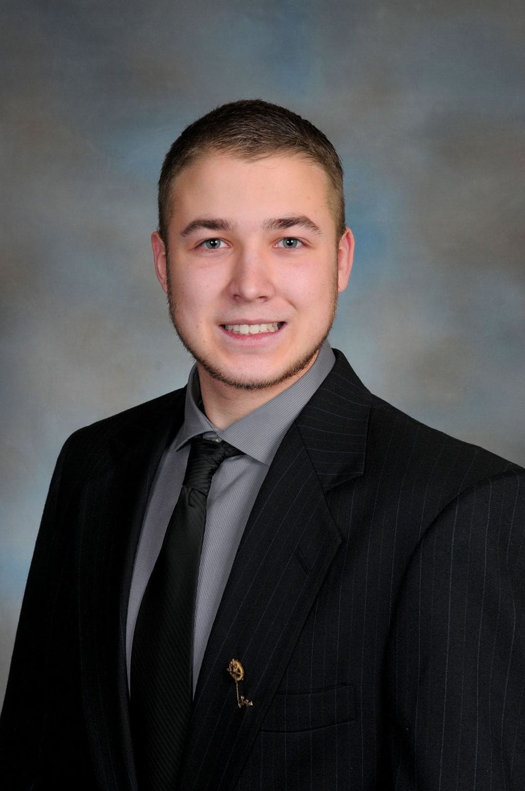 Young man in professional suit and tie.