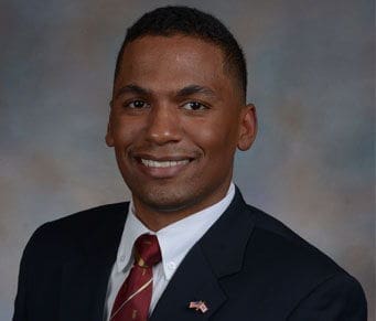 Jonathan Barrow Professional headshot of a smiling man in a suit.