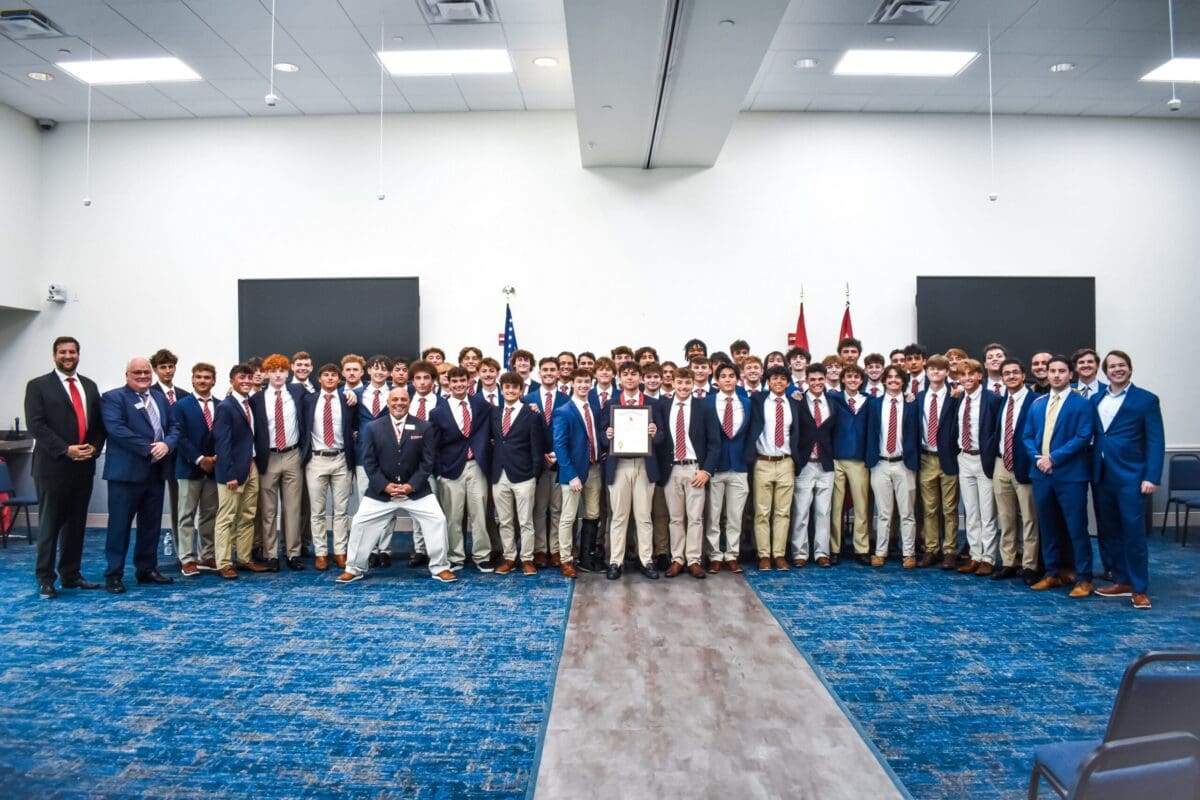 Group photo of students in formal attire.