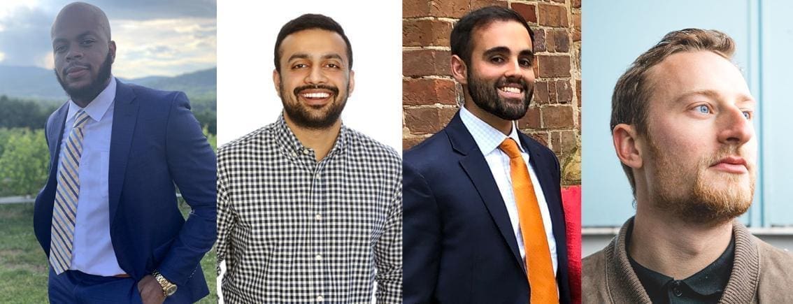 Two men smiling in professional attire.