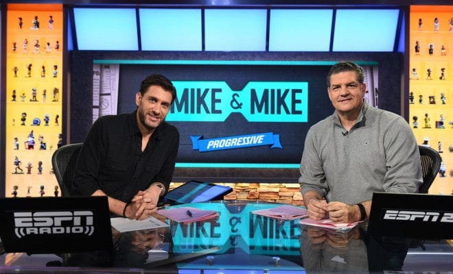 Mike and Mike Mike and Mike hosting a sports talk show.