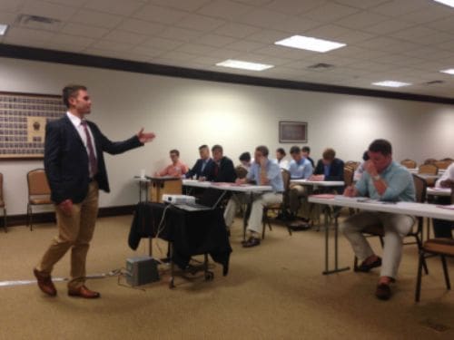 Business presentation in a classroom setting.