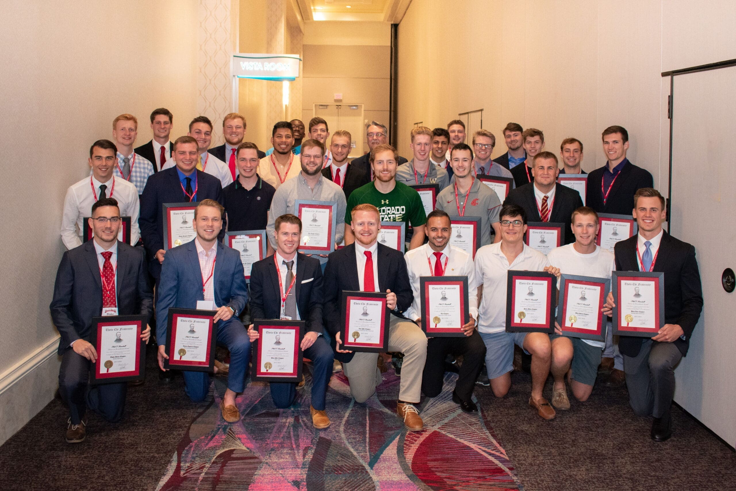 Group of award winners at a conference event.