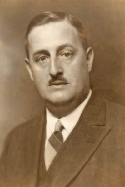 Black and white portrait of a distinguished man.
