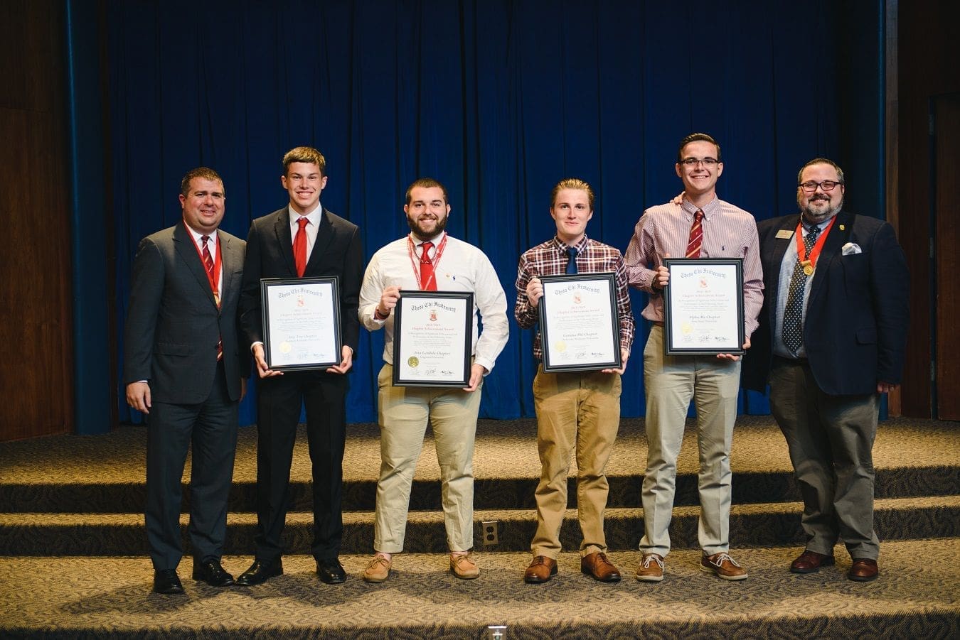 2018/2019 Achievement Awards Students receiving awards at a recognition ceremony.