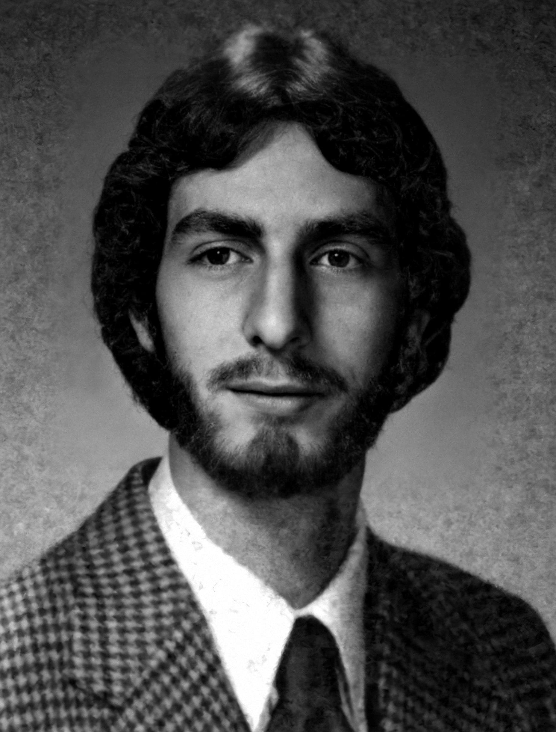 Black and white portrait of a young man.