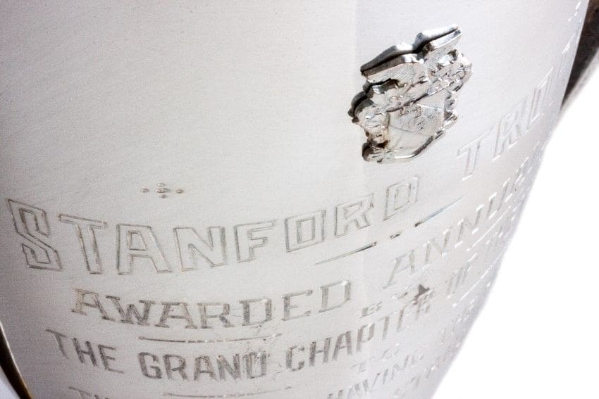 Stanford trophy with engraved award details.