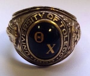 University of Toledo class ring with emblem design.