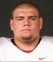 Football player headshot in uniform.