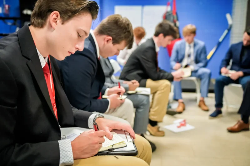 a group taking notes