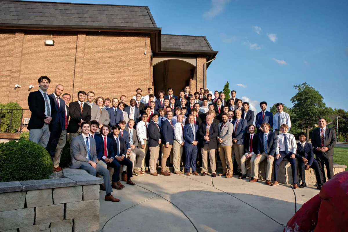 large group of Theta Chi Brothers in a courtyard