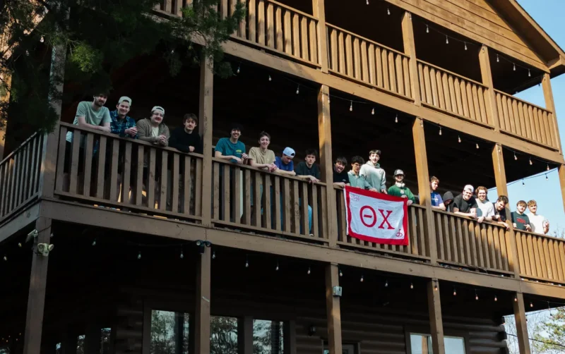 Gamma Mu members on a balcony