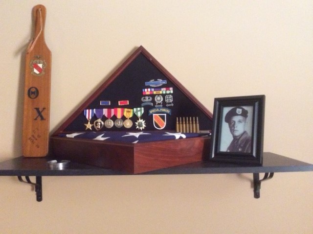 A display of award on a shelf
