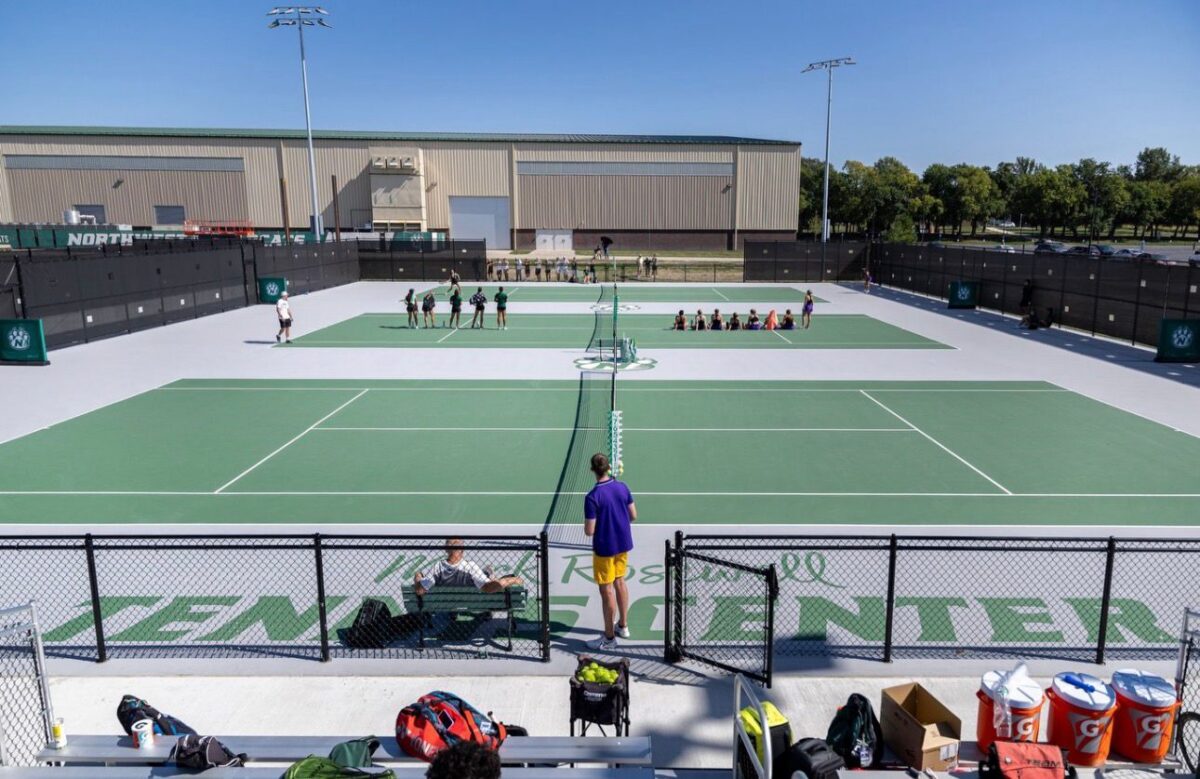 A tennis court in the light of day