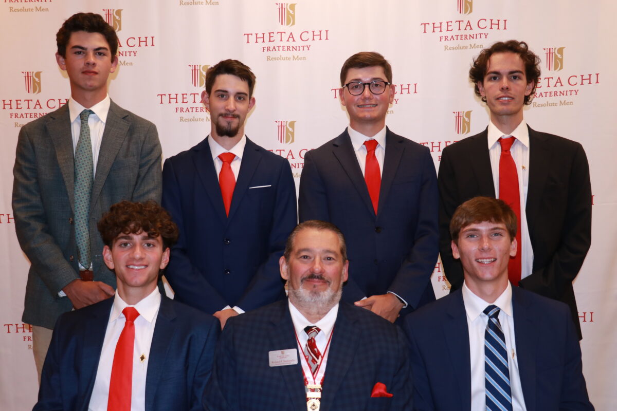 Brothers in suits together with Rich Santoriello, Grand Chapter Member