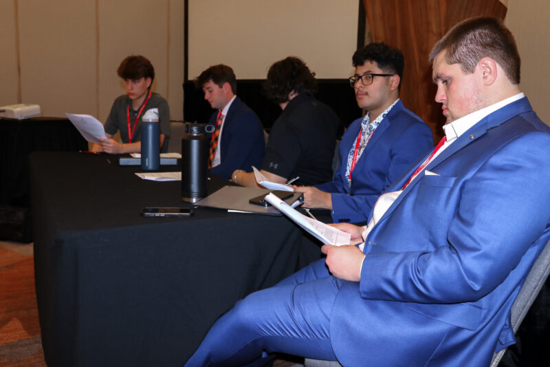 Brothers reviewing Vice Presidents Forum curriculum