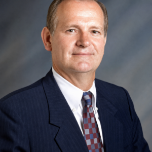 Headshot of Past International Presidents Richard L. "Dick" McCauley